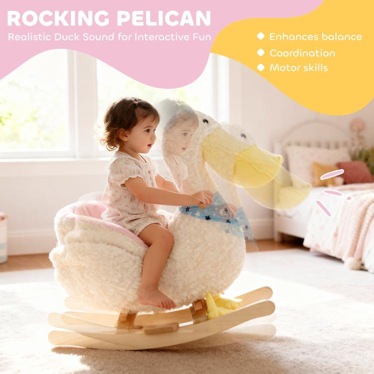 White plush duck rocking horse with pink seat and blue star apron, child riding on base