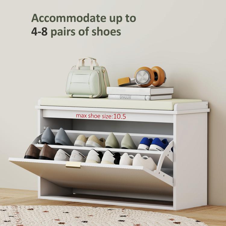 White shoe storage bench with padded top and open flip drawer, multiple shoe pairs inside