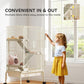 Beige rolling small animal cage with multi-level ramps and wire enclosure, by window