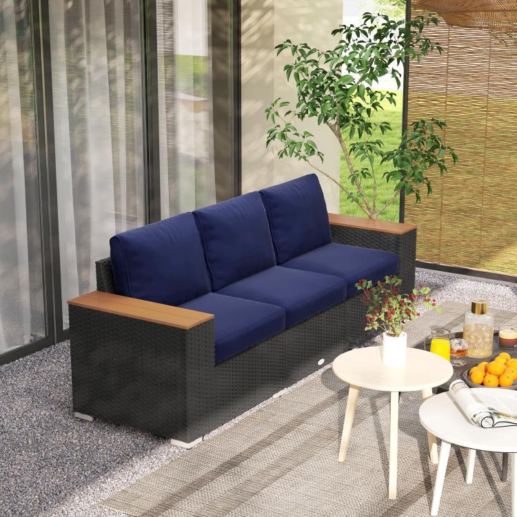 3-seat outdoor sofa with navy cushions, dark gray wicker body, wood-look armrests