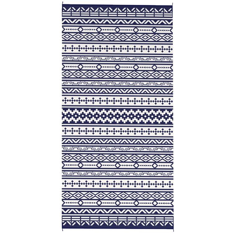 Reversible outdoor rug close-up, navy and white geometric stripes and motifs