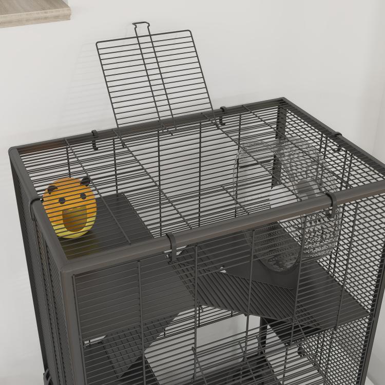 Top view of 4-tier hamster cage with dark wire panels, ramps, wheel, and glass base