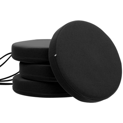 Set of 4 round black seat cushions, thick padded covers stacked for patio dining