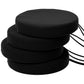Stacked round black patio seat cushions with ties, thick cushioned tops