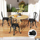 Round black seat cushions on dining chairs around a table