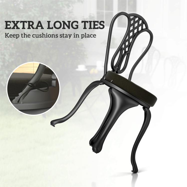 Round black seat cushion on an armless patio chair with tied cover