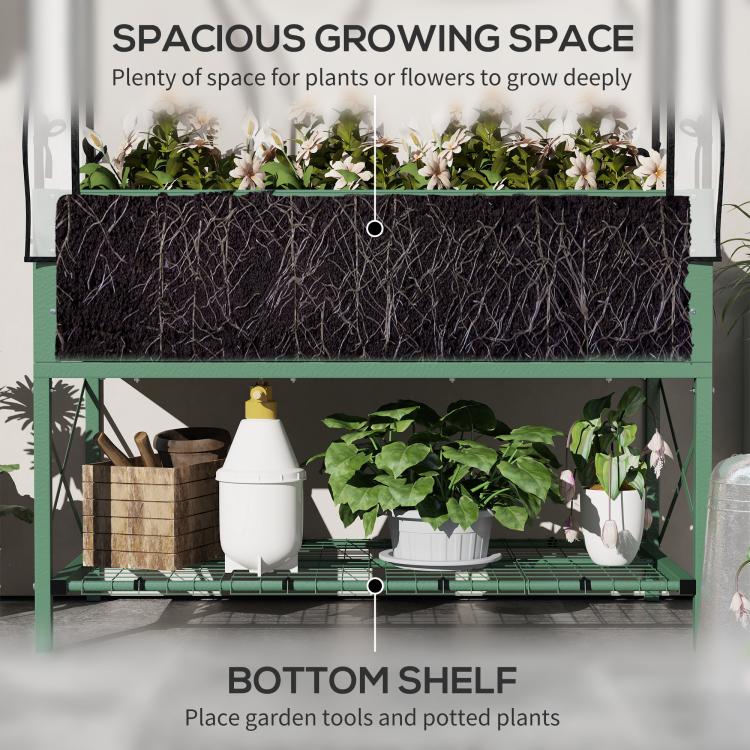 Green raised garden bed with clear cover showing top planter area and bottom shelf