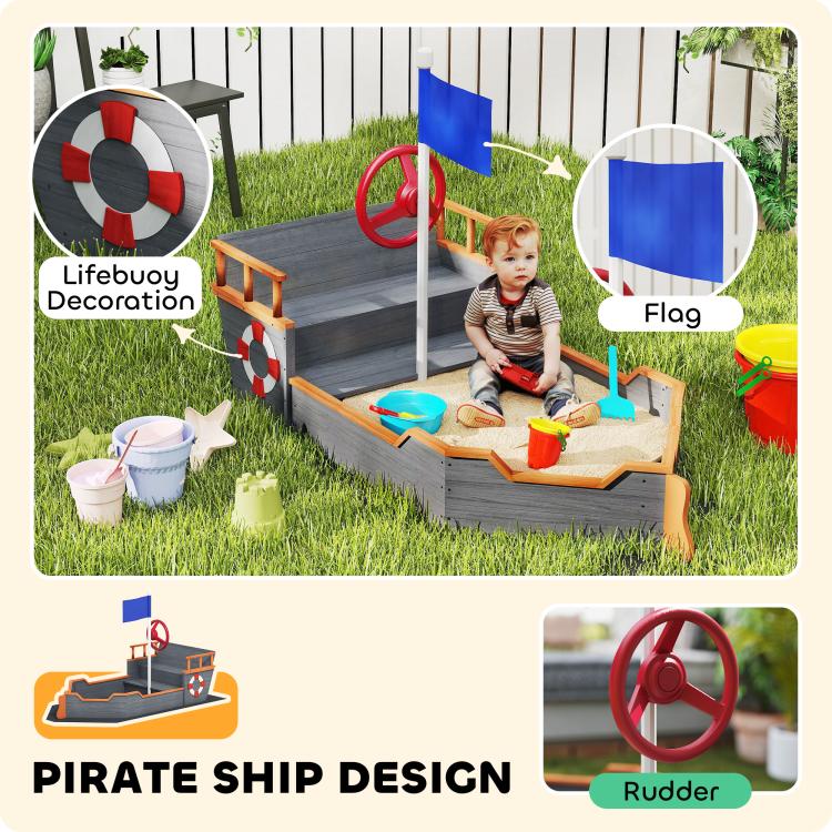 Kids pirate ship sandbox with red wheel, blue flag, and lifebuoy-style decoration