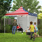 American flag pop-up canopy tent with gray sidewalls in a backyard lawn