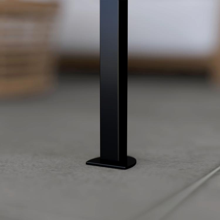 Dark gray metal pergola post with square base on concrete floor
