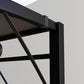 Close-up of dark gray gazebo roof support beams and slanted canopy fabric