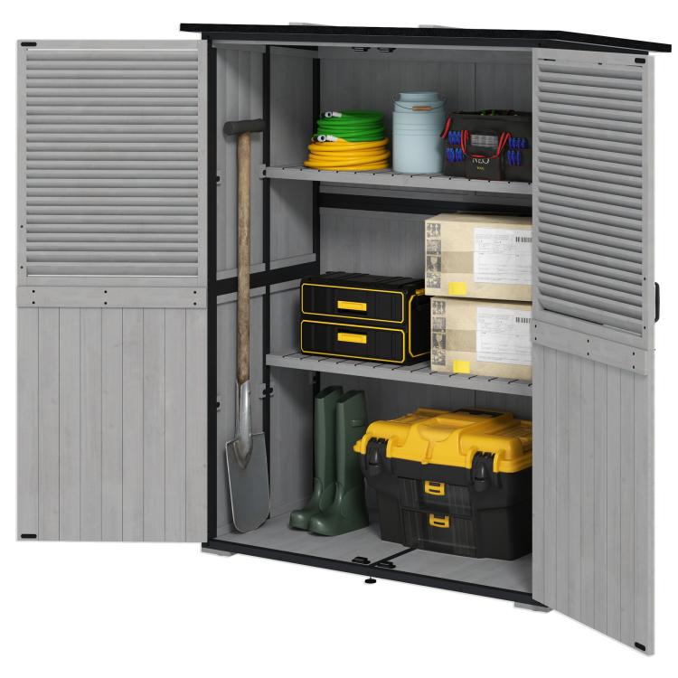 Gray outdoor storage shed open to show two shelves and organized interior