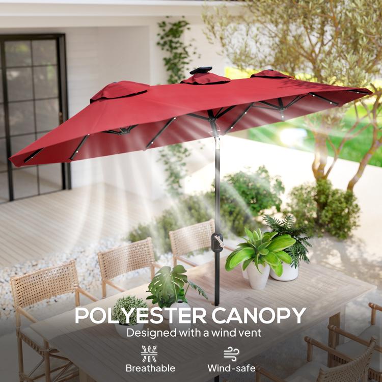 Wine red polyester umbrella canopy with LED lights under open patio shade