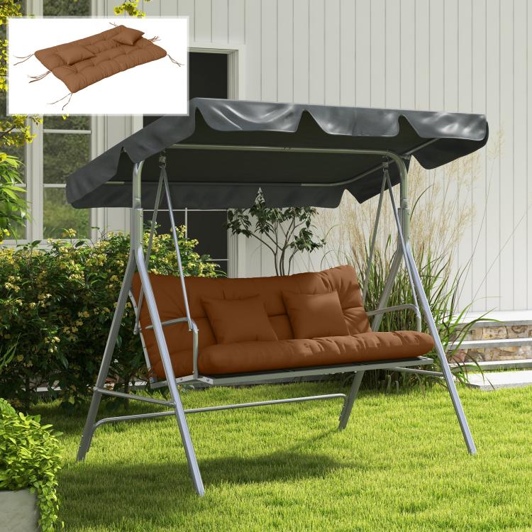 Tan tufted bench cushion set on outdoor swing seat with two pillows