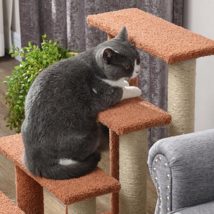 Brown 4-level cat step tower with carpet platforms, sisal posts, and gray cat perched