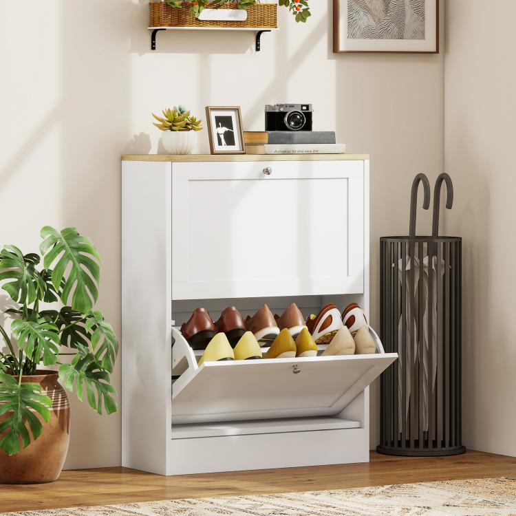 White slim shoe storage cabinet with flip drawers open and shoes displayed inside