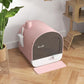 Pink enclosed cat litter box with lid, built-in filter, and side scoop storage