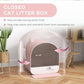 Pink enclosed cat litter box with rotating arrow cover over the front opening