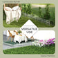 White metal landscape border fence around yard flowers and a seating area