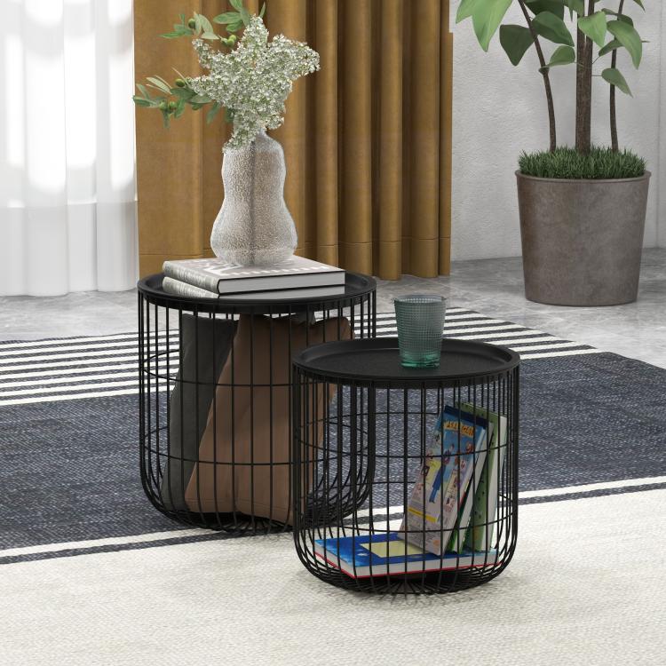 Black round nesting coffee table set with wire basket frames and dark round tabletops