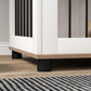 Dog kennel end table with black feet and white cabinet panels with black bars
