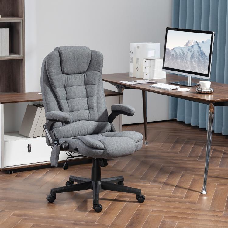 Gray massage chair with stitched back panels, headrest, and padded adjustable footrest