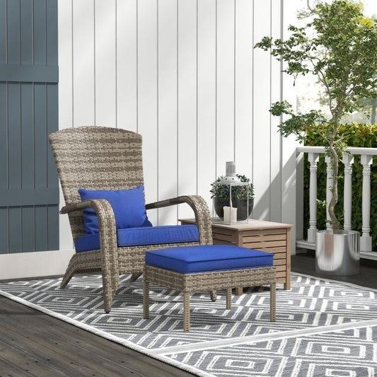 Wicker lounge chair and ottoman with blue cushions on outdoor patio