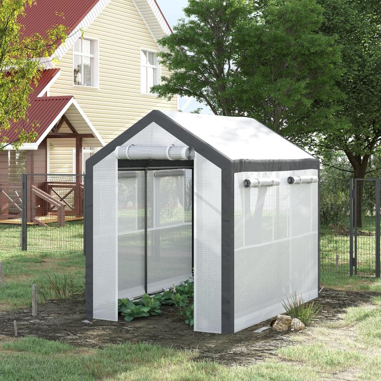 Walk-in tunnel greenhouse with mesh door and roll-up window panels, dark gray frame