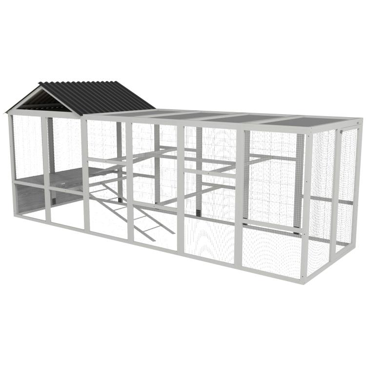 Gray chicken coop run with black roof, enclosed wire mesh panels and interior perches