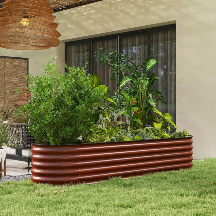 Brown metal raised garden bed with ribbed sides holding tall leafy plants