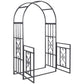 Grey metal garden arbor arch with hinged double doors open, heart motif inserts