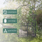 Grey metal garden arbor arch with open double doors and heart scrollwork detailing