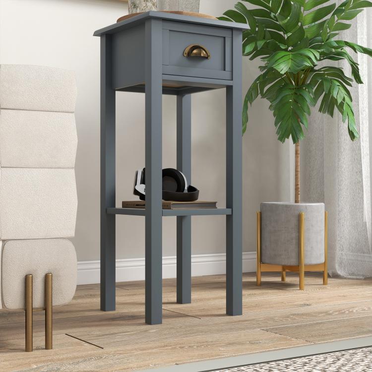 Gray side table with drawer and open lower shelf, shown from a front-right angle.