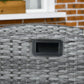 Close-up of black handle inset on gray woven reclining chair armrest