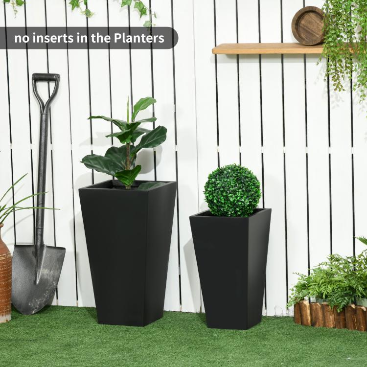 Two black outdoor square planters with leafy plants