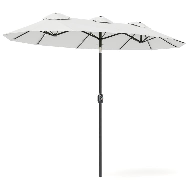 White double-sided patio umbrella with tilted canopy and central pole