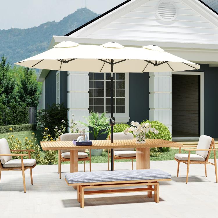 White double-sided patio umbrella with vented canopy and central crank pole
