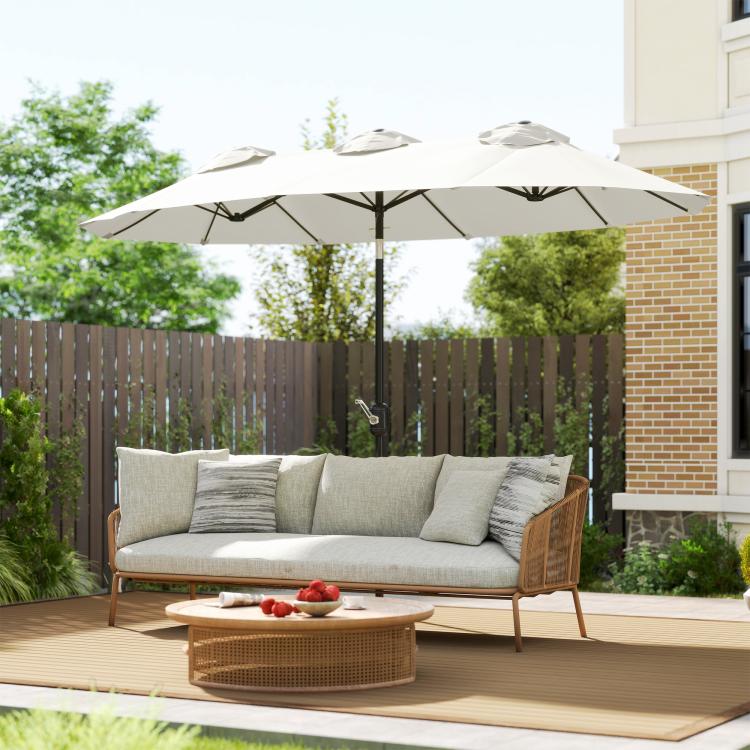 White patio umbrella canopy above an outdoor deck with central pole