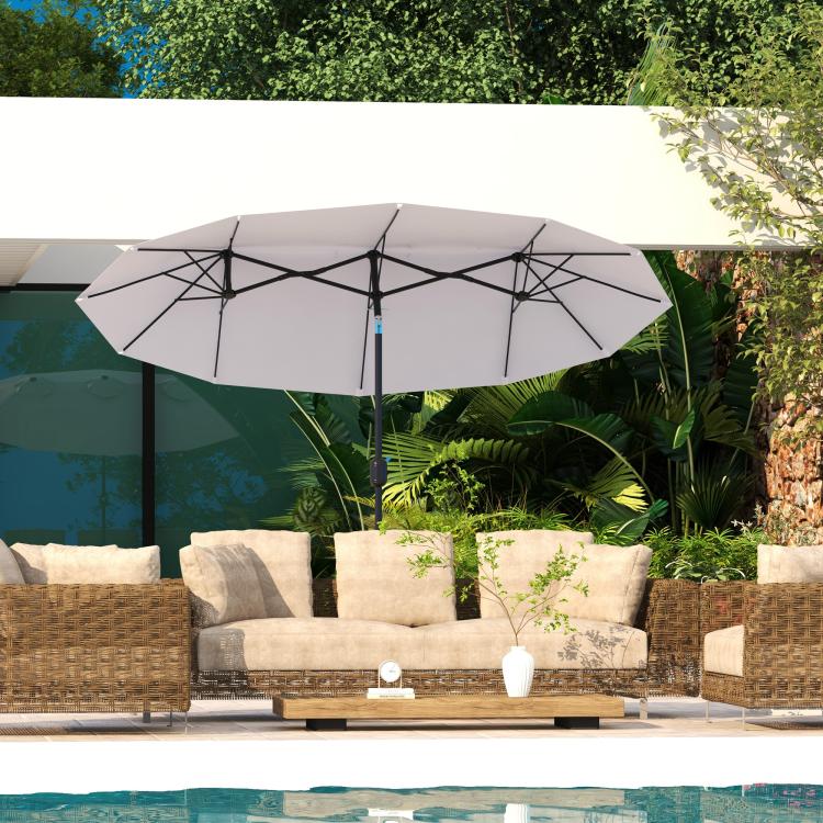 White patio umbrella with open canopy and central pole