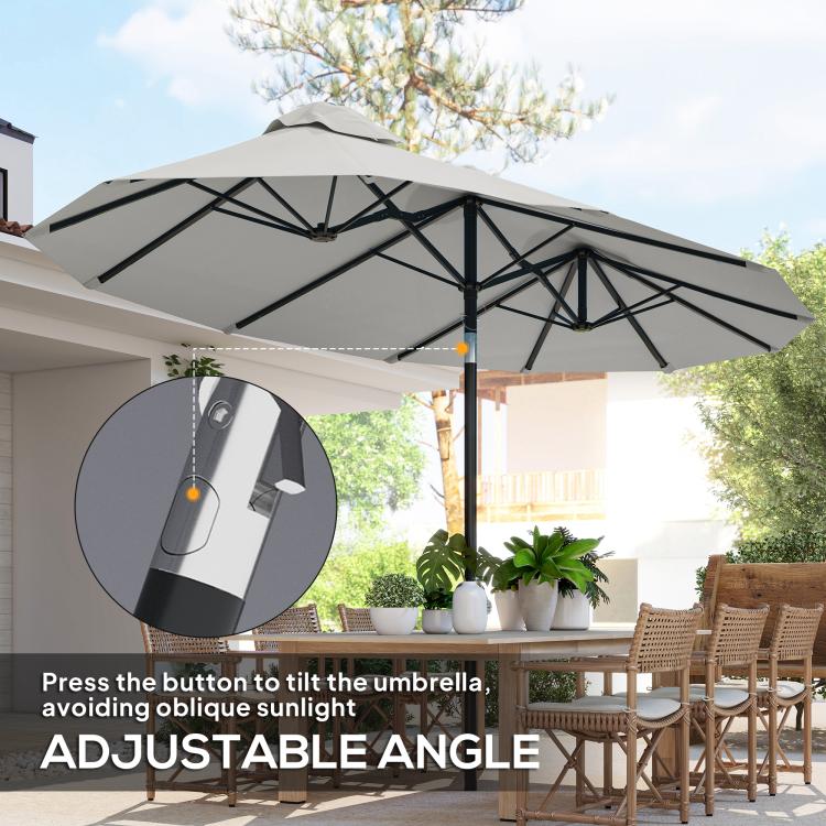 White patio umbrella with adjustable tilt control on the central pole