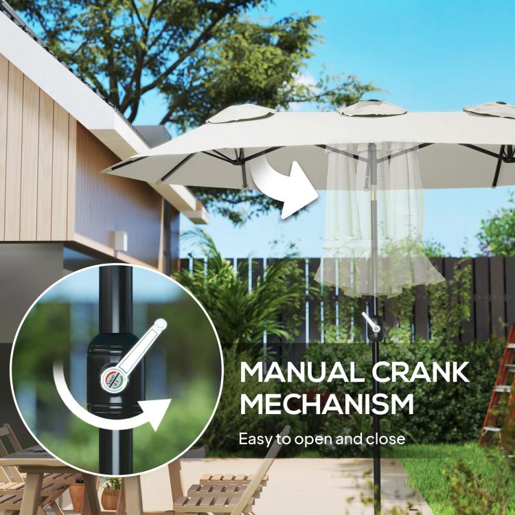 White patio umbrella with manual crank handle on the central pole