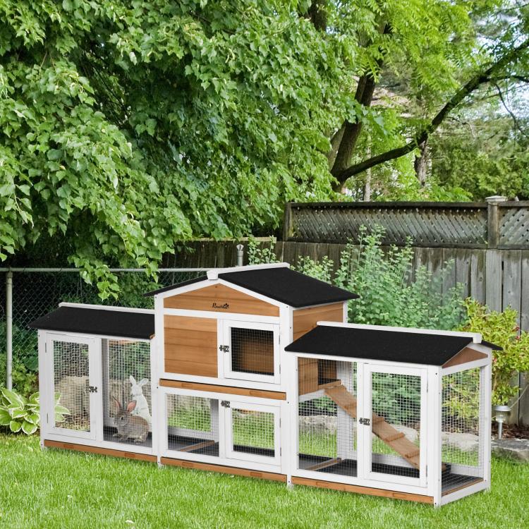 Rabbit playpen hutch in white with wire mesh sides, black roofs, and wooden ramp