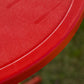 Close-up of red umbrella edge with textured fabric finish