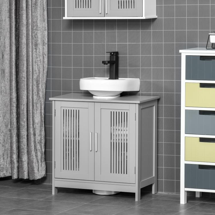 Grey bathroom vanity storage cabinet with two slatted doors and raised sink base.