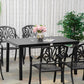 Outdoor patio dining table with black rectangular tabletop and metal legs