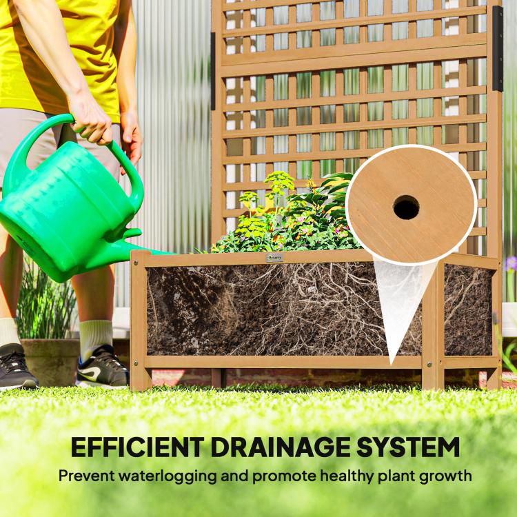 Wood raised planter bed with drainage outlet showing soil fill area and planter frame