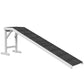 Foldable dog ramp with black carpet non-slip surface, grey frame, white side rails