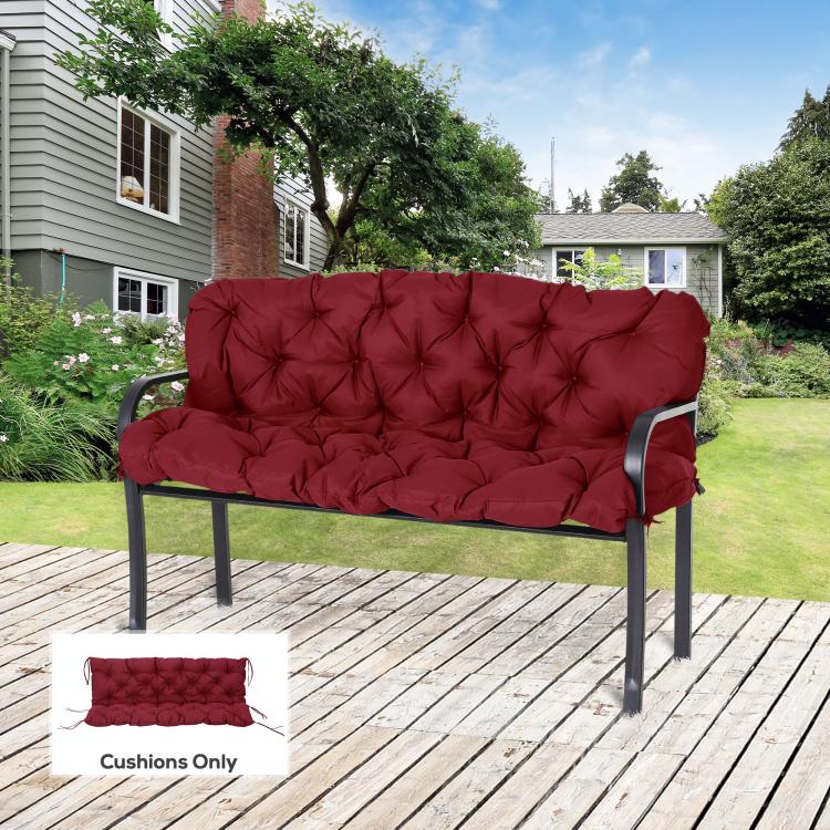 Wine red tufted bench cushion with diamond quilting on outdoor metal frame