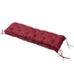Wine red tufted bench cushion with diamond quilting and tied corners on top view