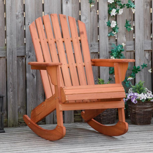 Outdoor wooden Adirondack rocking chair with slatted backrests and rounded rocker legs